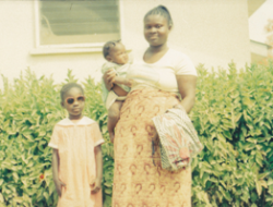 The girl after the surgery, and proudly posing with mom and a baby sister