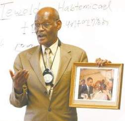 Tewolde Habtemicael speaks to a group of government students at Carson High School on Wednesday. (Cathleen Allison/Nevada Appeal)